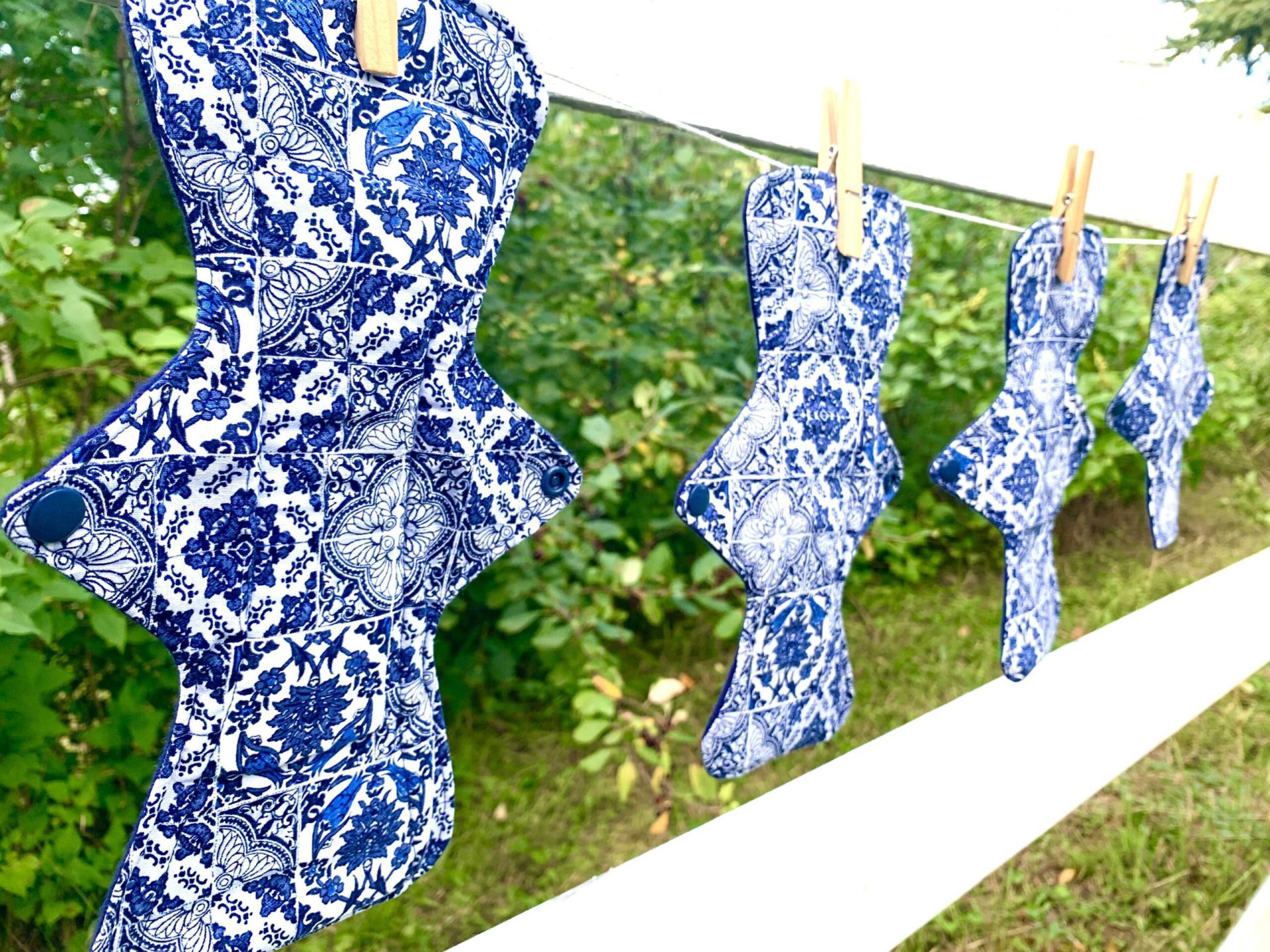 Blue pads on clothesline